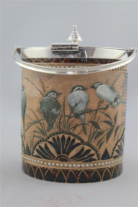 A Doulton Lambeth stoneware biscuit barrel, by Florence E. Barlow, dated 1884, 16cm. to finial